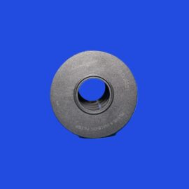 Close-up of a metallic circular washer partially visible against a vivid blue background.