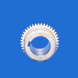 Partial silver gear with teeth visible at the bottom center against a solid blue background