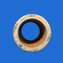 Close-up of a metal circular ring with an orange gasket against a blue background