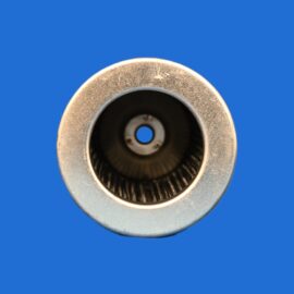 Macro photo of a metal cylindrical opening with a ridged inner edge and a central hole against a solid blue background