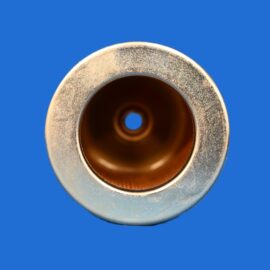Top-down close-up of a silver metal ring with a hollow brown interior against a solid blue background, minimal scene.
