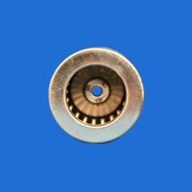 Close-up of a metal circular mechanical part with a central hole, set against a solid blue background.