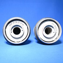 Two camera lens barrels at the bottom edge of the frame against a blue background, viewed from above.