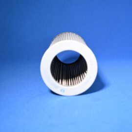 Close-up of a white cylindrical object with a black pleated interior on a blue background.