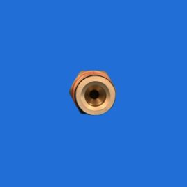 Close-up of a copper cylinder with circular grooves near the bottom center against a solid blue background, partially visible in the frame.