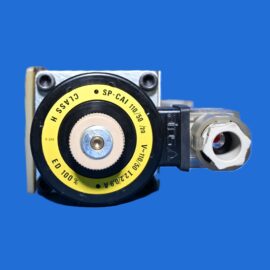 Close-up of a vintage camera lens with a yellow control dial against a blue background