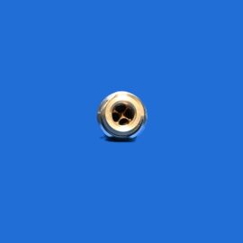 Close-up of a metallic circular connector with multiple pins on a solid blue background, viewed from above at the bottom center of the image.