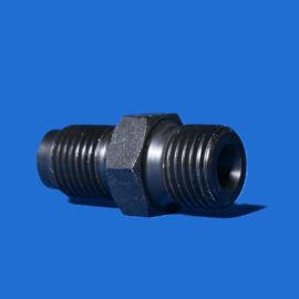 Metal threaded pipe fitting lying on a blue background, showing a hexagonal nut and external threads.