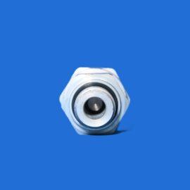 Close-up of a silver camera lens barrel pointing toward the viewer on a blue background