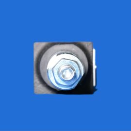 Close-up of a bolt with washer securing a metal bracket, against a solid blue background.