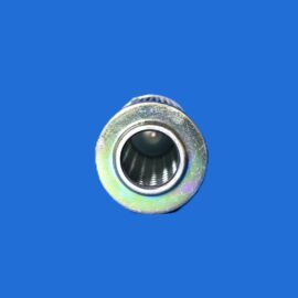 Close-up of a silver threaded metal nut facing the camera against a solid blue background, foreground focus on the inner bore.
