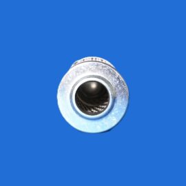 Close-up of a silver bottle cap at the bottom edge against a solid blue background.