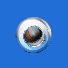 Close-up of a silver circular metal ring with a hollow center on a solid blue background.