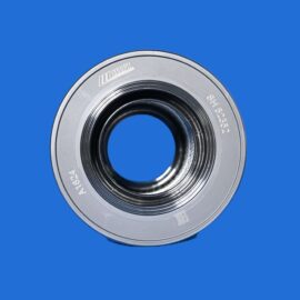 Close-up of a silver camera lens ring set against a solid blue background, showing engraved text and inner glass elements.
