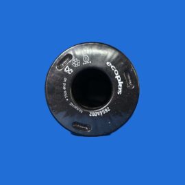 Partial view of a black circular reel with white text and symbols, visible against a solid blue background.