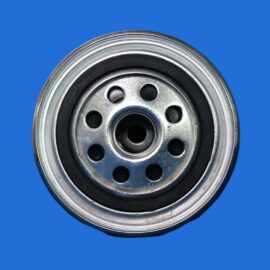 Close-up of a metal circular component with a central bore and multiple holes on a blue background.