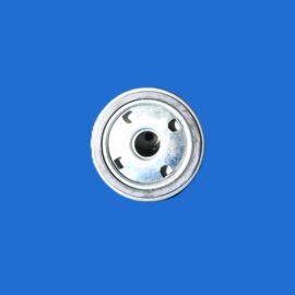 Close-up of a shiny metal can lid visible in the bottom-right against a solid blue background