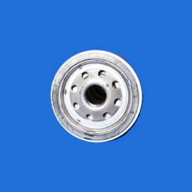 Close-up of a silver metal circular component with multiple holes on a solid blue background