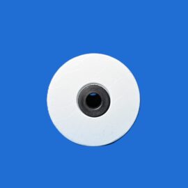Close-up of a white circular spool with a black center hub on a blue background.