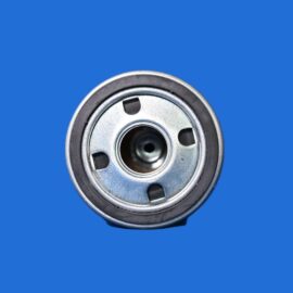 Close-up of a metallic circular bearing partially visible against a solid blue background.