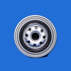 Close-up of a metal car wheel hub with circular bolt holes on a solid blue background, isolated image.