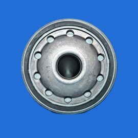 Close-up of a metal wheel hub with lug holes against a solid blue background.