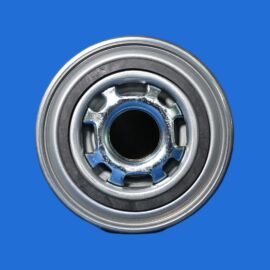 Close-up of a metal automotive wheel hub bearing with inner race and ventilation holes on a blue background
