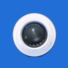 Close-up of a silver metal ring with a dark center against a blue background, showing a partial circular edge at the bottom.
