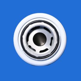 Close-up of a shiny metal bearing against a blue background.