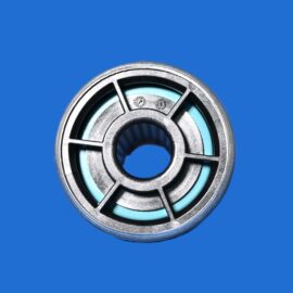 Close-up of a metal bearing with a light blue inner ring against a solid blue background