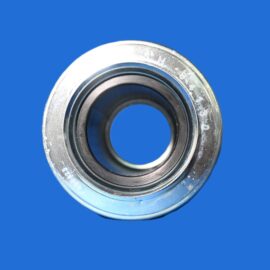 Close-up of a metal bearing race with inner and outer rings on a blue background.