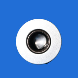 Close-up of a camera lens with a metal ring against a solid blue background
