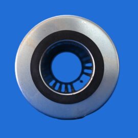 Close-up of a silver circular metal component with an inner black ring on a blue background.