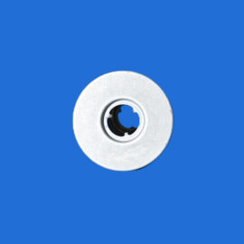 White circular object with a central hole partially visible near the bottom edge on a solid blue background