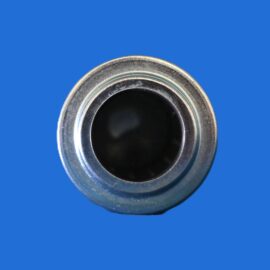 Close-up of a metallic cylindrical opening with concentric rings and a dark hollow center on a solid blue background.