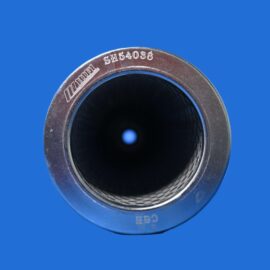 Close-up of a metal cylindrical tube with stamped numbers, viewed from the rim against a blue background.