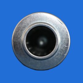 Close-up of a silver metal circular flange with a dark hollow center against a blue background.