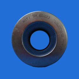 Close-up of a metallic circular seal with a blue inner ring, set against a solid blue background.