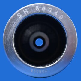 Close-up of a metal combination lock dial with numbered ring against a solid blue background, showing the inner dark cavity and a blue center pin.