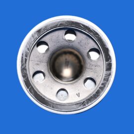Close-up of a metal circular hub with several holes, centered on a bright blue background.