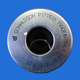 Close-up of a metal spool with a central hole and engraved alphanumeric text around the rim on a blue background.