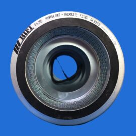 Close-up of a hydraulic filter element with perforated inner chamber against a blue background.