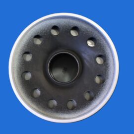 Close-up of a dark circular machine part with multiple evenly spaced holes around a central bore, set against a blue background