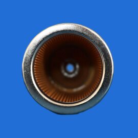 Close-up of a shiny metal ring with a brown ribbed interior on a blue background, viewed from the top. It looks like a lens opening or connector.
