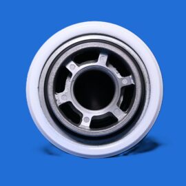 Macro photo of a metal bearing with inner hole and spokes, set against a blue background.