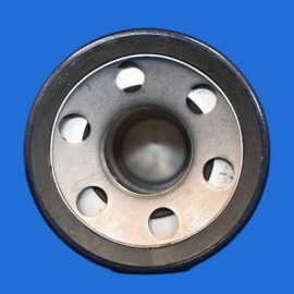 Close-up of a metal bearing or pulley with circular holes against a solid blue background. / 6-hole pattern visible, edge of the part shown.