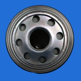 Close-up of a silver steel car wheel rim with circular holes, set against a solid blue background