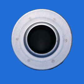 Close-up of a metal circular flange with a black bore in the center against a blue background.