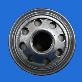 Close-up of a silver metal wheel rim with circular ventilation holes on a solid blue background, showing its metallic texture.