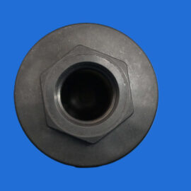 Close-up of a black cylindrical metal part with a hexagonal nut against a blue background, viewed from above.